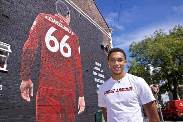 LIVERPOOL, ENGLAND - Thursday, August 8, 2019: Liverpool's Trent Alexander-Arnold poses for photograph with a mural of himself on the side of a building in Sybil Road, Anfield. The mural was commissioned by The Anfield Wrap and painted by local artist Akse P19. (Pic by David Rawcliffe/Propaganda)