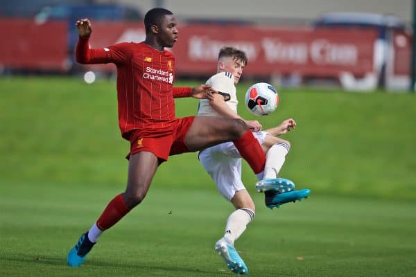KIRKBY, ENGLAND - Saturday, August 31, 2019: Liverpool's Billy Koumetio (L) and Manchester United's Charlie Wellens during the Under-18 FA Premier League match between Liverpool FC and Manchester United at the Liverpool Academy. (Pic by David Rawcliffe/Propaganda)
