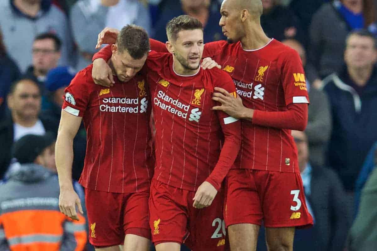 LIVERPOOL, ENGLAND - Saturday, October 5, 2019: Liverpool's James Milner (L) celebrates with team-mates Adam Lallana (C) and Fabio Henrique Tavares 'Fabinho' (R) after scoring the winning second goal, an injury time penalty, during the FA Premier League match between Liverpool FC and Leicester City FC at Anfield. Liverpool won 2-1. (Pic by David Rawcliffe/Propaganda)