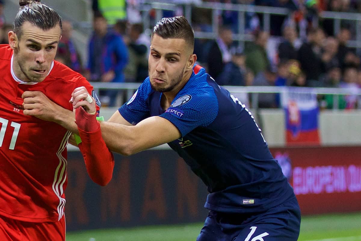 TRNAVA, SLOVAKIA - Thursday, October 10, 2019: Wales' captain Gareth Bale (L) and Slovakia's Dávid Hancko during the UEFA Euro 2020 Qualifying Group E match between Slovakia and Wales at the Štadión Antona Malatinského. (Pic by David Rawcliffe/Propaganda)