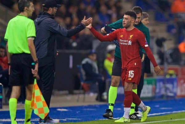 GENK, BELGIUM - Wednesday, October 23, 2019: Liverpool's double goal-scorer Alex Oxlade-Chamberlain shakes hands with manager Jürgen Klopp as he is substituted during the UEFA Champions League Group E match between KRC Genk and Liverpool FC at the KRC Genk Arena. (Pic by David Rawcliffe/Propaganda)