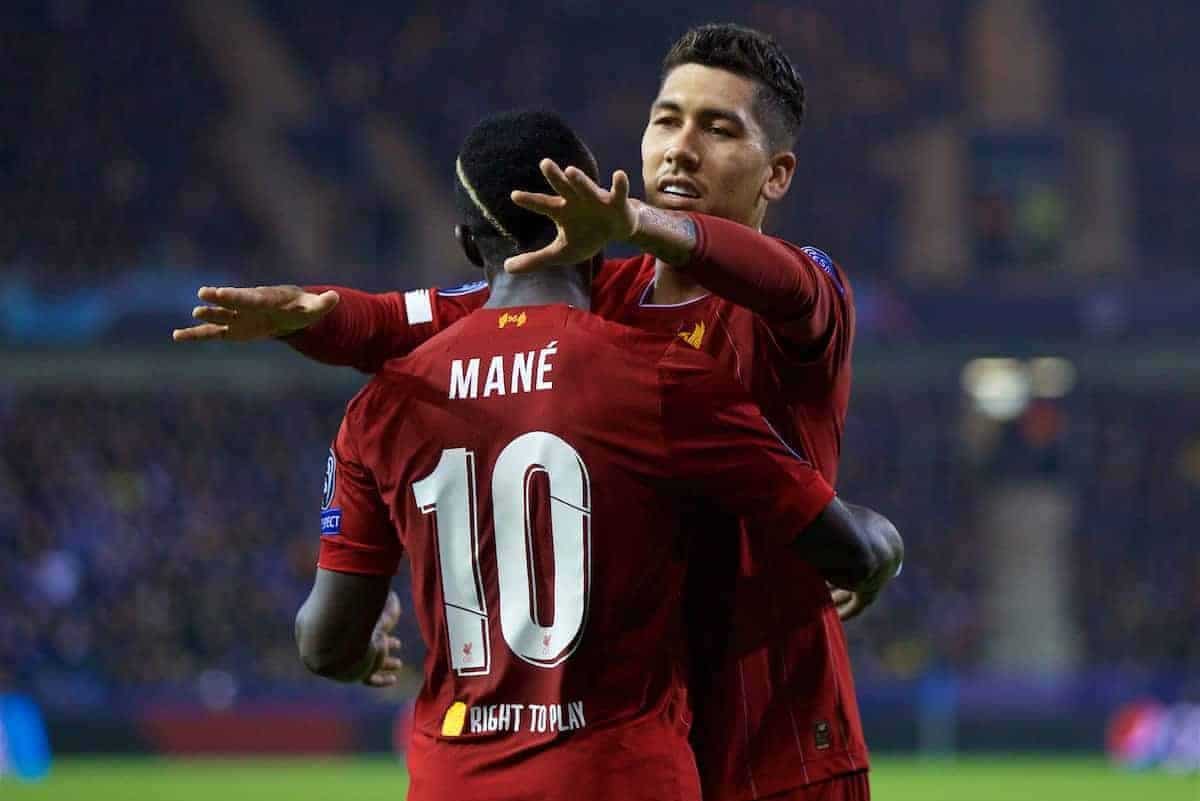 GENK, BELGIUM - Wednesday, October 23, 2019: Liverpool's Sadio Mané (L) celebrates scoring the third goal with team-mate Roberto Firmino during the UEFA Champions League Group E match between KRC Genk and Liverpool FC at the KRC Genk Arena. (Pic by David Rawcliffe/Propaganda)