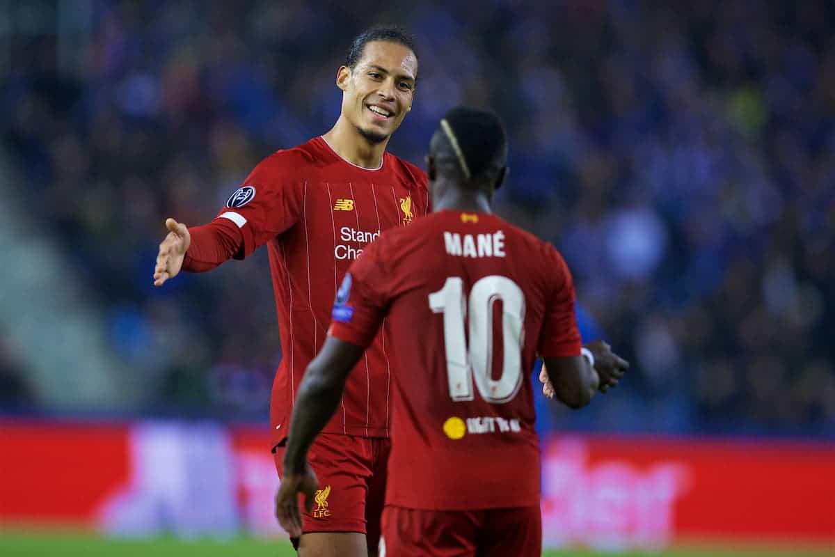 GENK, BELGIUM - Wednesday, October 23, 2019: Liverpool's Sadio Mané (R) celebrates scoring the third goal with team-mate Virgil van Dijk during the UEFA Champions League Group E match between KRC Genk and Liverpool FC at the KRC Genk Arena. (Pic by David Rawcliffe/Propaganda)