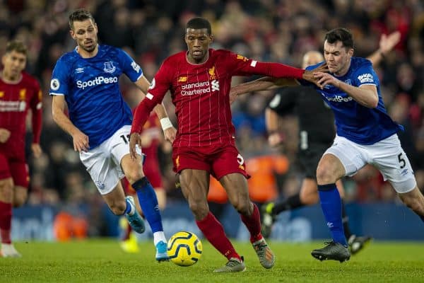 LIVERPOOL, ENGLAND - Wednesday, December 4, 2019: Liverpool's Georginio Wijnaldum gets away from Everton's Morgan Schneiderlin (L) and Michael Keane (R) during the FA Premier League match between Liverpool FC and Everton FC, the 234th Merseyside Derby, at Anfield. (Pic by David Rawcliffe/Propaganda)