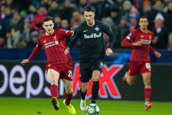 SALZBURG, AUSTRIA - Tuesday, December 10, 2019: Liverpool's Andy Robertson (L) and FC Salzburg's Dominik Szoboszlai during the final UEFA Champions League Group E match between FC Salzburg and Liverpool FC at the Red Bull Arena. (Pic by David Rawcliffe/Propaganda)