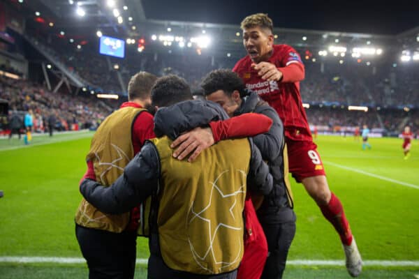 SALZBURG, AUSTRIA - Tuesday, December 10, 2019: Liverpool's Mohamed Salah (hidden) celebrates scoring the second goal with team-mates as Roberto Firmino jumps ontop during the final UEFA Champions League Group E match between FC Salzburg and Liverpool FC at the Red Bull Arena. (Pic by David Rawcliffe/Propaganda)