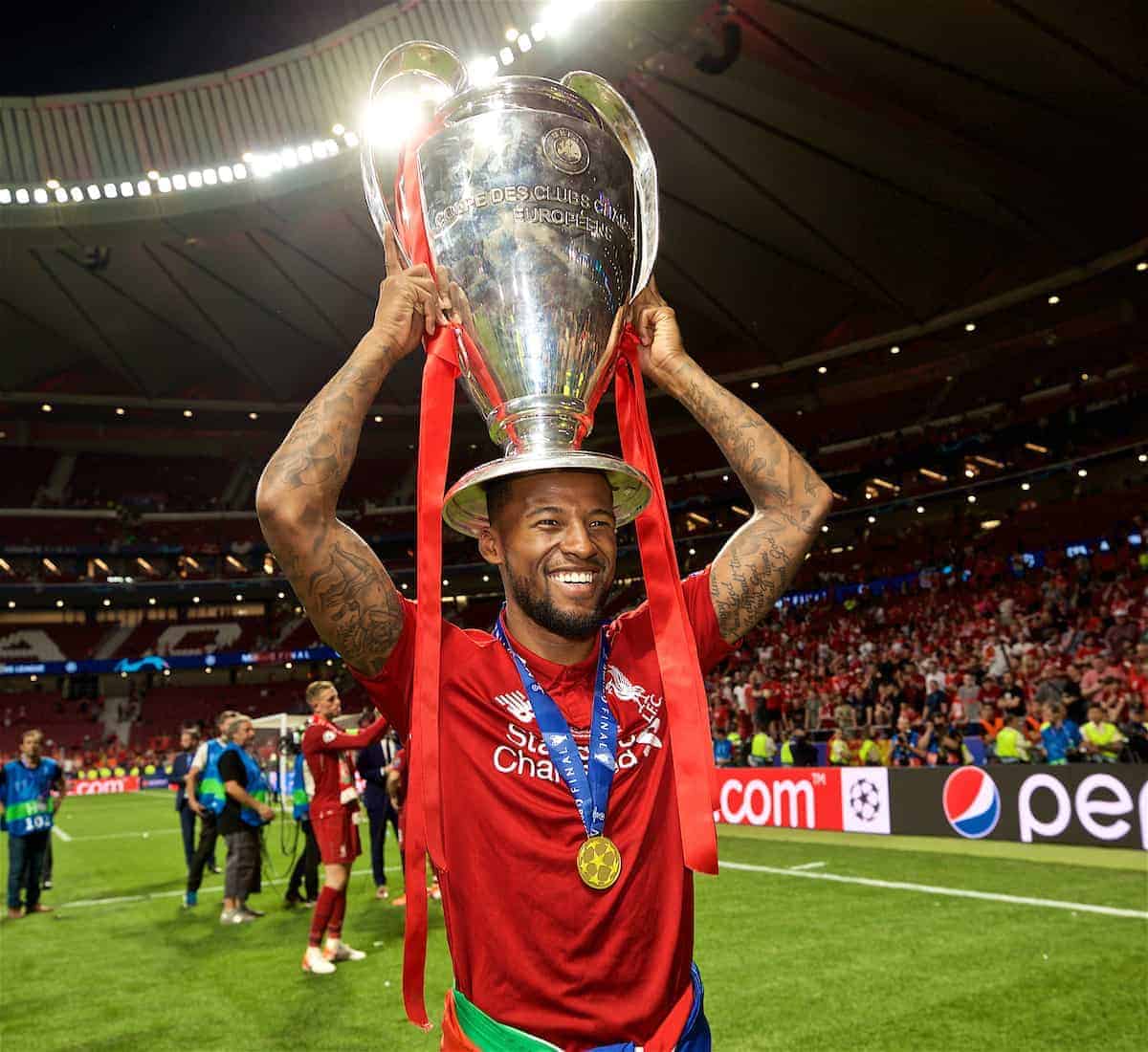 MADRID, SPAIN - SATURDAY, JUNE 1, 2019: Liverpool's Georginio Wijnaldum with the trophy after the UEFA Champions League Final match between Tottenham Hotspur FC and Liverpool FC at the Estadio Metropolitano. Liverpool won 2-0 to win their sixth European Cup. (Pic by David Rawcliffe/Propaganda)