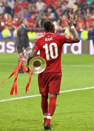 MADRID, SPAIN - SATURDAY, JUNE 1, 2019: Liverpool's Sadio Mane with the trophy after the UEFA Champions League Final match between Tottenham Hotspur FC and Liverpool FC at the Estadio Metropolitano. Liverpool won 2-0 to win their sixth European Cup. (Pic by David Rawcliffe/Propaganda)