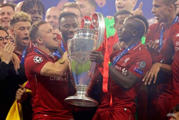 MADRID, SPAIN - SATURDAY, JUNE 1, 2019: Liverpool's Xherdan Shaqiri (L) and Sadio Mane (R) lift the trophy after the UEFA Champions League Final match between Tottenham Hotspur FC and Liverpool FC at the Estadio Metropolitano. Liverpool won 2-0 tp win their sixth European Cup. (Pic by David Rawcliffe/Propaganda)