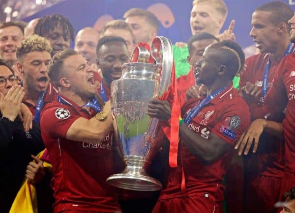 MADRID, SPAIN - SATURDAY, JUNE 1, 2019: Liverpool's Xherdan Shaqiri (L) and Sadio Mane (R) lift the trophy after the UEFA Champions League Final match between Tottenham Hotspur FC and Liverpool FC at the Estadio Metropolitano. Liverpool won 2-0 tp win their sixth European Cup. (Pic by David Rawcliffe/Propaganda)