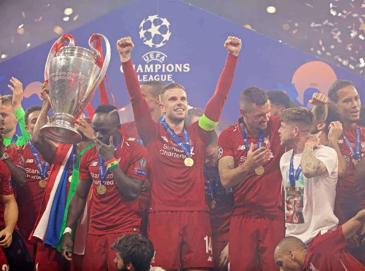 jordan henderson lifting champions league trophy