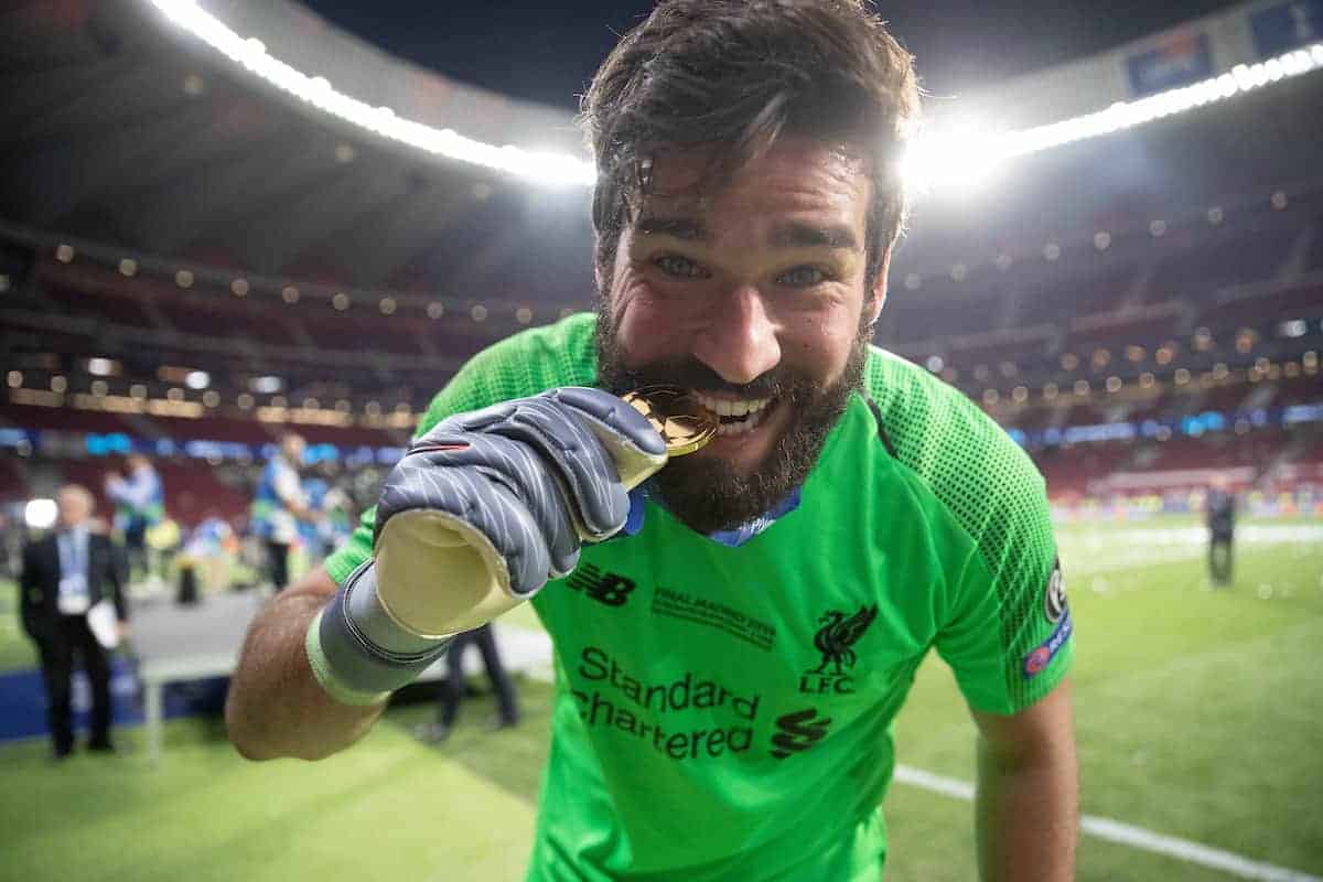 MADRID, SPAIN - SATURDAY, JUNE 1, 2019: Liverpool's goalkeeper Alisson Becker celebrates by biting his medal after the UEFA Champions League Final match between Tottenham Hotspur FC and Liverpool FC at the Estadio Metropolitano. Liverpool won 2-0 to win their sixth European Cup. (Pic by Peter Makadi/Propaganda)
