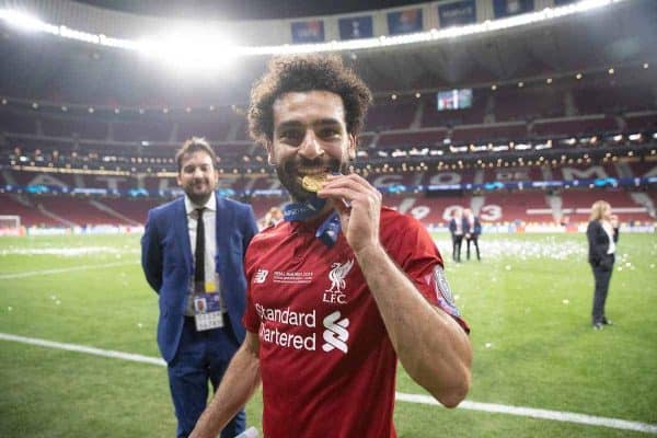 MADRID, SPAIN - SATURDAY, JUNE 1, 2019: Liverpool's Mohamed Salah celebrates by biting his medal after the UEFA Champions League Final match between Tottenham Hotspur FC and Liverpool FC at the Estadio Metropolitano. Liverpool won 2-0 to win their sixth European Cup. (Pic by Peter Makadi/Propaganda)