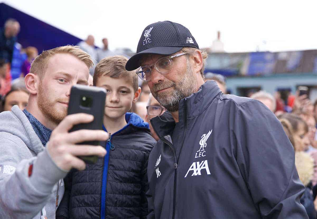 BIRKENHEAD, ENGLAND - Thursday, July 11, 2019: Liverpool's manager Jürgen Klopp poses for a selfie with a supporter before a pre-season friendly match between Tranmere Rovers FC and Liverpool FC at Prenton Park. (Pic by David Rawcliffe/Propaganda)