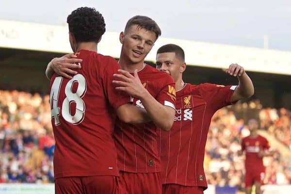 BIRKENHEAD, ENGLAND - Thursday, July 11, 2019: Liverpool's Curtis Jones (L) celebrates scoring the fourth goal with team-mate Bobby Duncan during a pre-season friendly match between Tranmere Rovers FC and Liverpool FC at Prenton Park. (Pic by David Rawcliffe/Propaganda)