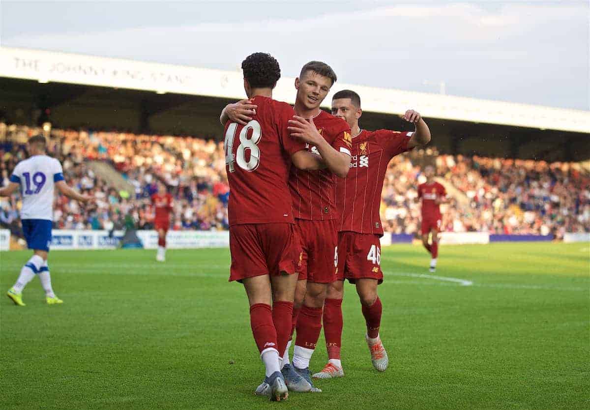 BIRKENHEAD, ENGLAND - Thursday, July 11, 2019: Liverpool's Curtis Jones (L) celebrates scoring the fourth goal with team-mate Bobby Duncan during a pre-season friendly match between Tranmere Rovers FC and Liverpool FC at Prenton Park. (Pic by David Rawcliffe/Propaganda)