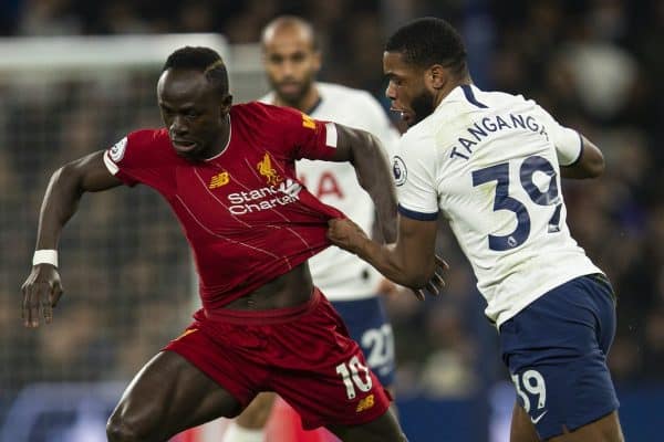 LONDON, ENGLAND - Saturday, January 11, 2020: Liverpool's Sadio Mané (L) is pulled back by Tottenham Hotspur's Japhet Tanganga during the FA Premier League match between Tottenham Hotspur FC and Liverpool FC at the Tottenham Hotspur Stadium. (Pic by David Rawcliffe/Propaganda)