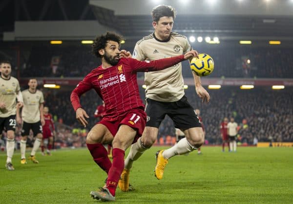 LIVERPOOL, ENGLAND - Sunday, January 19, 2020: Liverpool's Mohamed Salah (L) and Manchester United's captain Harry Maguire during the FA Premier League match between Liverpool FC and Manchester United FC at Anfield. (Pic by David Rawcliffe/Propaganda)