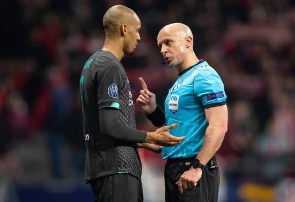 MADRID, SPAIN - Tuesday, February 18, 2020: Liverpool's Fabio Henrique Tavares 'Fabinho' is spoken to by referee Szymon Marciniak during the UEFA Champions League Round of 16 1st Leg match between Club Atlético de Madrid and Liverpool FC at the Estadio Metropolitano. (Pic by David Rawcliffe/Propaganda)