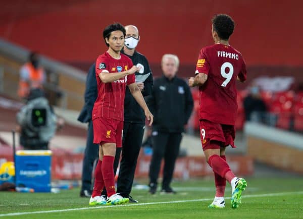 LIVERPOOL, ENGLAND - Wednesday, June 24, 2020: Liverpool’s substitute Takumi Minamino prepares to replace Roberto Firmino during the FA Premier League match between Liverpool FC and Crystal Palace FC at Anfield. The game was played behind closed doors due to the UK government’s social distancing laws during the Coronavirus COVID-19 Pandemic. (Pic by David Rawcliffe/Propaganda)