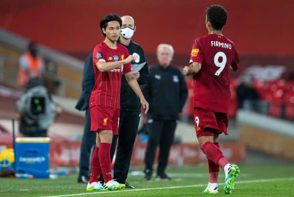 LIVERPOOL, ENGLAND - Wednesday, June 24, 2020: Liverpool’s substitute Takumi Minamino prepares to replace Roberto Firmino during the FA Premier League match between Liverpool FC and Crystal Palace FC at Anfield. The game was played behind closed doors due to the UK government’s social distancing laws during the Coronavirus COVID-19 Pandemic. (Pic by David Rawcliffe/Propaganda)