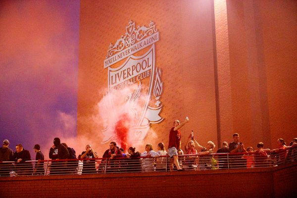 LIVERPOOL, ENGLAND - Thursday, June 25, 2020: Liverpool supporters celebrate at Anfield after their side were crowned Premier League Champions following Manchester City's defeat by Chelsea. The supporters have waited 30 years for this their 19th Championship title. (Pic by David Rawcliffe/Propaganda)