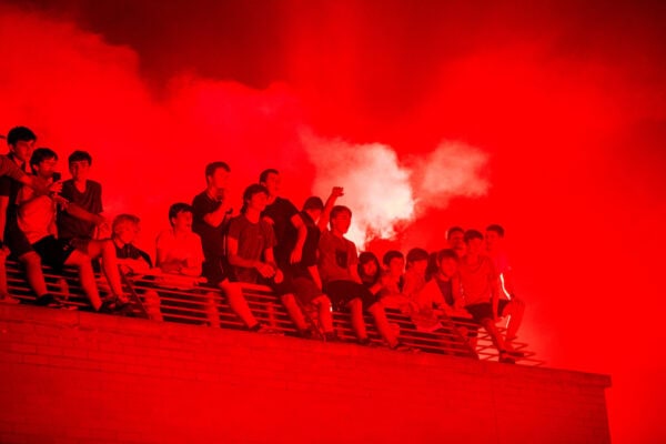 LIVERPOOL, ENGLAND - Thursday, June 25, 2020: Liverpool supporters celebrate at Anfield after their side were crowned Premier League Champions following Manchester City's defeat by Chelsea. The supporters have waited 30 years for this their 19th Championship title. (Pic by David Rawcliffe/Propaganda)