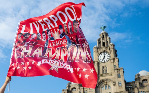 LIVERPOOL, ENGLAND - Friday, June 26, 2020: Liverpool supporters celebrate their team's Premier League title victory at the Pier Head, Liverpool. With government COVID-19 restrictions in place the games have been played behind closed doors without fans. Liverpool won their 19th top-flight Championshop with seven games of the seaosn left, a record, it was the club's first title in 30 years and the first of the FA Premier League era. (Pic by David Rawcliffe/Propaganda)