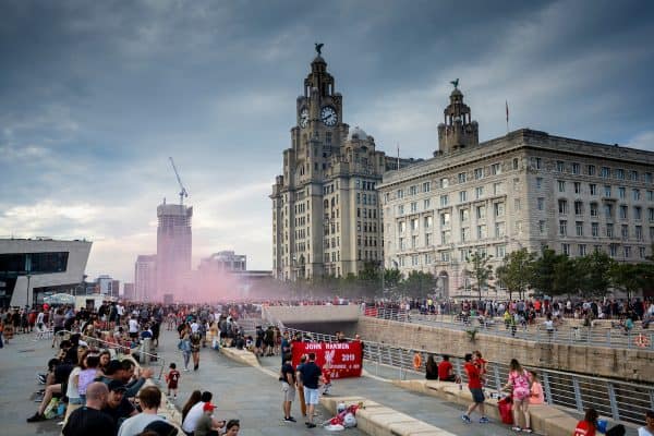 LIVERPOOL, ENGLAND - Friday, June 26, 2020: Liverpool supporters celebrate their team's Premier League title victory at the Pier Head, Liverpool. With government COVID-19 restrictions in place the games have been played behind closed doors without fans. Liverpool won their 19th top-flight Championshop with seven games of the seaosn left, a record, it was the club's first title in 30 years and the first of the FA Premier League era. (Pic by David Rawcliffe/Propaganda)