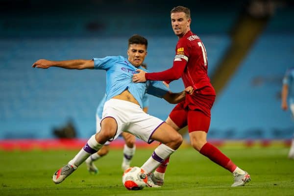 MANCHESTER, ENGLAND - Thursday, July 2, 2020: Liverpool’s captain Jordan Henderson (R) challenges Manchester City's Eric García during the FA Premier League match between Manchester City FC and Liverpool FC at the City of Manchester Stadium. The game was played behind closed doors due to the UK government’s social distancing laws during the Coronavirus COVID-19 Pandemic. This was Liverpool's first game as Premier League 2019/20 Champions. (Pic by Propaganda)