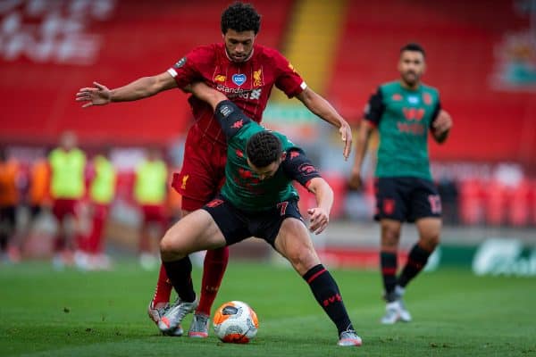 LIVERPOOL, ENGLAND - Sunday, July 5, 2020: Liverpool’s Alex Oxlade-Chamberlain (L) and Aston Villa's John McGinn during the FA Premier League match between Liverpool FC and Aston Villa FC at Anfield. The game was played behind closed doors due to the UK government’s social distancing laws during the Coronavirus COVID-19 Pandemic. (Pic by David Rawcliffe/Propaganda)