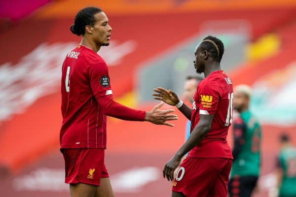 LIVERPOOL, ENGLAND - Sunday, July 5, 2020: Liverpool’s Sadio Mané (R) celebrates scoring the first goal with team-mate Virgil van Dijk (L) during the FA Premier League match between Liverpool FC and Aston Villa FC at Anfield. The game was played behind closed doors due to the UK government’s social distancing laws during the Coronavirus COVID-19 Pandemic. (Pic by David Rawcliffe/Propaganda)