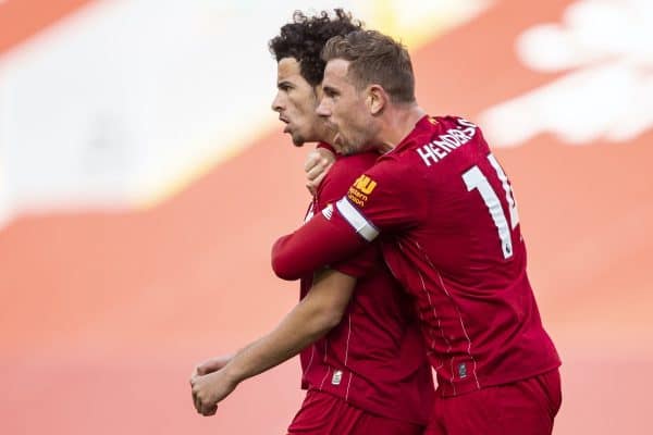 LIVERPOOL, ENGLAND - Sunday, July 5, 2020: Liverpool’s Curtis Jones celebrates scoring the second goal with team-mate captain Jordan Henderson (R) during the FA Premier League match between Liverpool FC and Aston Villa FC at Anfield. The game was played behind closed doors due to the UK government’s social distancing laws during the Coronavirus COVID-19 Pandemic. (Pic by David Rawcliffe/Propaganda)