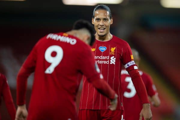 LIVERPOOL, ENGLAND - Wednesday, July 22, 2020: Liverpool’s Virgil van Dijk celebrates with goal-scorer Roberto Firmino after the fourth goal during the FA Premier League match between Liverpool FC and Chelsea FC at Anfield. The game was played behind closed doors due to the UK government’s social distancing laws during the Coronavirus COVID-19 Pandemic. (Pic by David Rawcliffe/Propaganda)