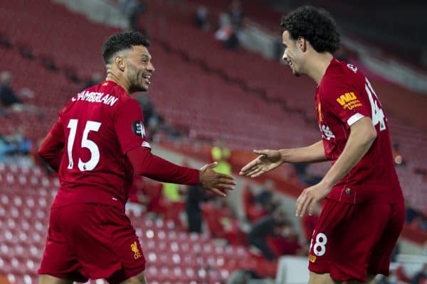 LIVERPOOL, ENGLAND - Wednesday, July 22, 2020: Liverpool’s Alex Oxlade-Chamberlain (C) celebrates scoring his side's fifth goal, to make the score 5-3, with team-mate Curtis Jones during the FA Premier League match between Liverpool FC and Chelsea FC at Anfield. The game was played behind closed doors due to the UK government’s social distancing laws during the Coronavirus COVID-19 Pandemic. (Pic by David Rawcliffe/Propaganda)