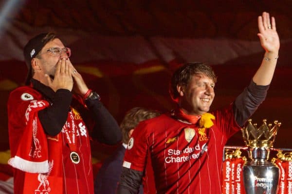 LIVERPOOL, ENGLAND - Wednesday, July 22, 2020: Liverpool’s manager Jürgen Klopp (L) and assistant manager Peter Krawietz celebrate on the podium during the trophy presentation as the Reds are crowned Champions after the FA Premier League match between Liverpool FC and Chelsea FC at Anfield. The game was played behind closed doors due to the UK government’s social distancing laws during the Coronavirus COVID-19 Pandemic. (Pic by David Rawcliffe/Propaganda)