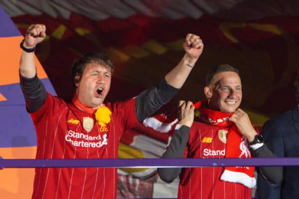 LIVERPOOL, ENGLAND - Wednesday, July 22, 2020: Liverpool’s assistant manager Peter Krawietz (L) and first-team development coach Pepijn Lijnders celebrate on the podium during the trophy presentation as the Reds are crowned Champions after the FA Premier League match between Liverpool FC and Chelsea FC at Anfield. The game was played behind closed doors due to the UK government’s social distancing laws during the Coronavirus COVID-19 Pandemic. (Pic by David Rawcliffe/Propaganda)