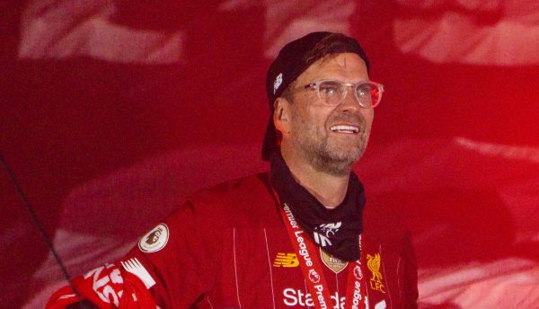 LIVERPOOL, ENGLAND - Wednesday, July 22, 2020: Liverpool’s manager Jürgen Klopp (L) and assistant manager Peter Krawietz celebrate on the podium during the trophy presentation as the Reds are crowned Champions after the FA Premier League match between Liverpool FC and Chelsea FC at Anfield. The game was played behind closed doors due to the UK government’s social distancing laws during the Coronavirus COVID-19 Pandemic. (Pic by David Rawcliffe/Propaganda)