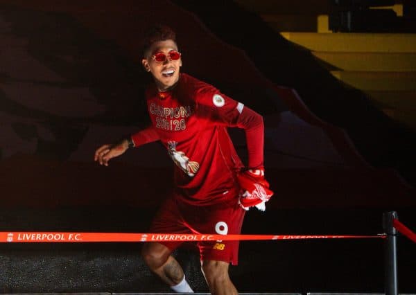 LIVERPOOL, ENGLAND - Wednesday, July 22, 2020: Liverpool’s Roberto Firmino celebrates on the podium during the trophy presentation as the Reds are crowned Champions after the FA Premier League match between Liverpool FC and Chelsea FC at Anfield. The game was played behind closed doors due to the UK government’s social distancing laws during the Coronavirus COVID-19 Pandemic. (Pic by David Rawcliffe/Propaganda)