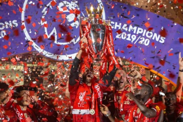 LIVERPOOL, ENGLAND - Wednesday, July 22, 2020: Liverpool’s goalkeeper Alisson Becker lifts the Premier League trophy during the presentation as the Reds are crowned Champions after the FA Premier League match between Liverpool FC and Chelsea FC at Anfield. The game was played behind closed doors due to the UK government’s social distancing laws during the Coronavirus COVID-19 Pandemic. (Pic by David Rawcliffe/Propaganda)