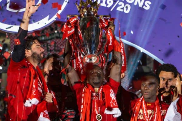 LIVERPOOL, ENGLAND - Wednesday, July 22, 2020: Liverpool’s Sadio Mané lifts the Premier League trophy during the presentation as the Reds are crowned Champions after the FA Premier League match between Liverpool FC and Chelsea FC at Anfield. The game was played behind closed doors due to the UK government’s social distancing laws during the Coronavirus COVID-19 Pandemic. (Pic by David Rawcliffe/Propaganda)