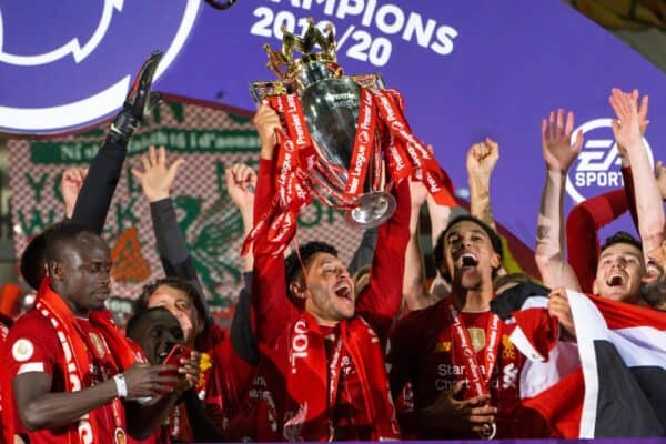 LIVERPOOL, ENGLAND - Wednesday, July 22, 2020: Liverpool’s Alex Oxlade-Chamberlain lifts the Premier League trophy during the presentation as the Reds are crowned Champions after the FA Premier League match between Liverpool FC and Chelsea FC at Anfield. The game was played behind closed doors due to the UK government’s social distancing laws during the Coronavirus COVID-19 Pandemic. (Pic by David Rawcliffe/Propaganda)
