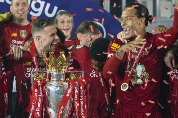 LIVERPOOL, ENGLAND - Wednesday, July 22, 2020: Liverpool's captain Jordan Henderson (C) celebrate with Virgil van Dijk and the Premier League trophy as the Reds are crowned Champions after the FA Premier League match between Liverpool FC and Chelsea FC at Anfield. The game was played behind closed doors due to the UK government’s social distancing laws during the Coronavirus COVID-19 Pandemic. (Pic by David Rawcliffe/Propaganda)