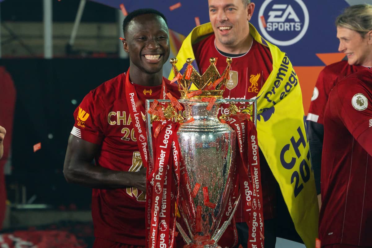 LIVERPOOL, ENGLAND - Wednesday, July 22, 2020: Liverpool's Naby Keita with the Premier League trophy as the Reds are crowned Champions after the FA Premier League match between Liverpool FC and Chelsea FC at Anfield. The game was played behind closed doors due to the UK government’s social distancing laws during the Coronavirus COVID-19 Pandemic. (Pic by David Rawcliffe/Propaganda)