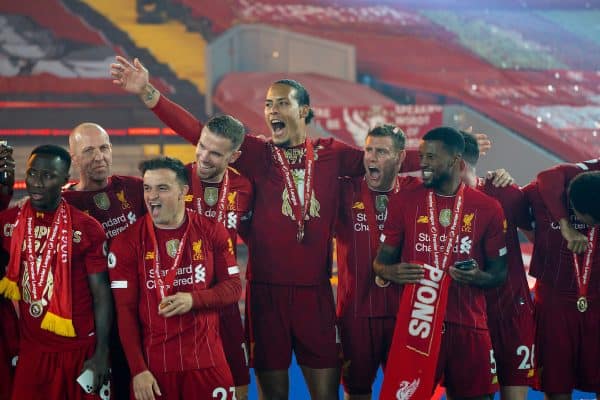 LIVERPOOL, ENGLAND - Wednesday, July 22, 2020: Liverpool’s Naby Keita, Xherdan Shaqiri, captain Jordan Henderson, Virgil van Dijk, James Milner and Georginio Wijnaldum celebrate after being crowned Premier League champions after the FA Premier League match between Liverpool FC and Chelsea FC at Anfield. The game was played behind closed doors due to the UK government’s social distancing laws during the Coronavirus COVID-19 Pandemic. Liverpool won 5-3. (Pic by David Rawcliffe/Propaganda)