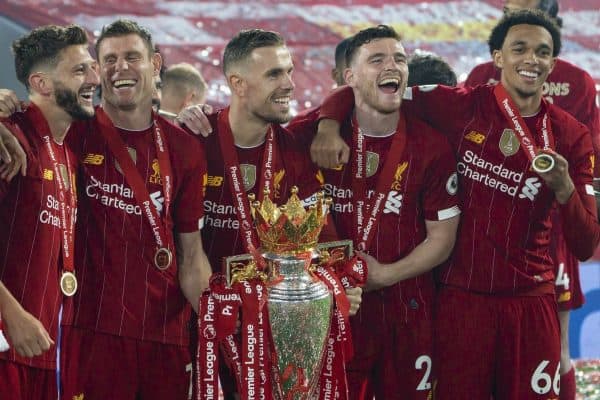 LIVERPOOL, ENGLAND - Wednesday, July 22, 2020: Liverpool’s Joe Gomez, Alex Oxlade-Chamberlain, Adam Lallana, James Milner, captain Jordan Henderson, Andy Robertson and Trent Alexander-Arnold celebrate with the Premier League trophy and their winners' medal as the Reds are crowned Champions after the FA Premier League match between Liverpool FC and Chelsea FC at Anfield. The game was played behind closed doors due to the UK government’s social distancing laws during the Coronavirus COVID-19 Pandemic. Liverpool won 5-3. (Pic by David Rawcliffe/Propaganda)