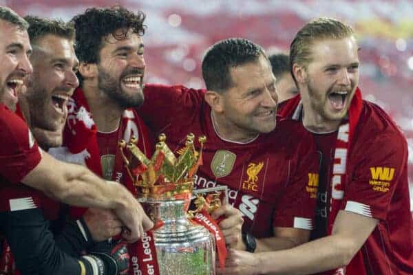 LIVERPOOL, ENGLAND - Wednesday, July 22, 2020: Liverpool’s goalkeeper Andy Lonergan, goalkeeper Adrián San Miguel del Castillo, goalkeeper Alisson Becker, goalkeeping coach John Achterberg and goalkeeper Caoimhin Kelleher celebrate with the Premier League trophy as the Reds are crowned Champions after the FA Premier League match between Liverpool FC and Chelsea FC at Anfield. The game was played behind closed doors due to the UK government’s social distancing laws during the Coronavirus COVID-19 Pandemic. Liverpool won 5-3. (Pic by David Rawcliffe/Propaganda)