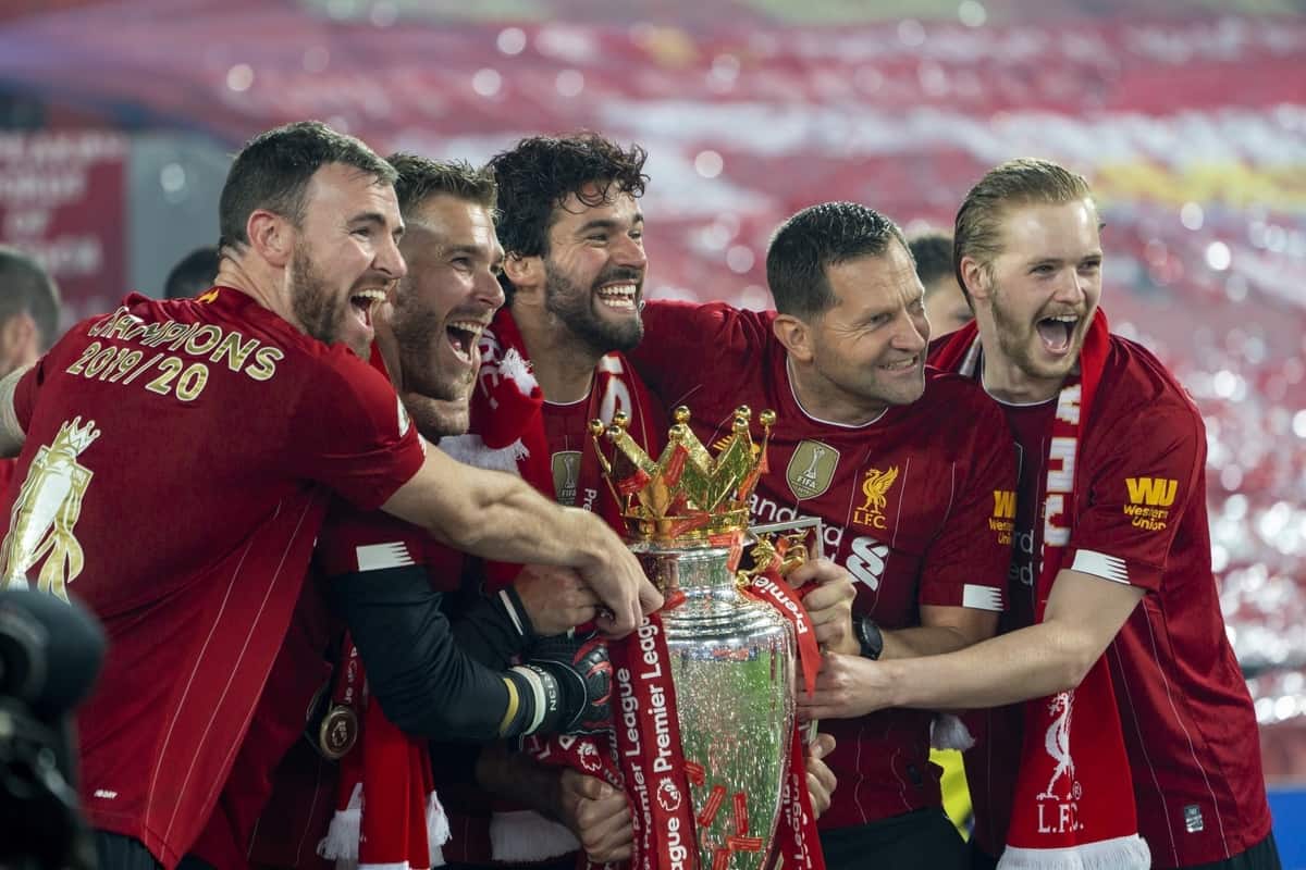 LIVERPOOL, ENGLAND - Wednesday, July 22, 2020: Liverpool’s goalkeeper Andy Lonergan, goalkeeper Adrián San Miguel del Castillo, goalkeeper Alisson Becker, goalkeeping coach John Achterberg and goalkeeper Caoimhin Kelleher celebrate with the Premier League trophy as the Reds are crowned Champions after the FA Premier League match between Liverpool FC and Chelsea FC at Anfield. The game was played behind closed doors due to the UK government’s social distancing laws during the Coronavirus COVID-19 Pandemic. Liverpool won 5-3. (Pic by David Rawcliffe/Propaganda)