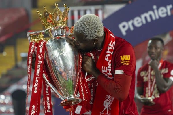 LIVERPOOL, ENGLAND - Wednesday, July 22, 2020: Liverpool’s Divock Origi kisses with the Premier League trophy as the Reds are crowned Champions after the FA Premier League match between Liverpool FC and Chelsea FC at Anfield. The game was played behind closed doors due to the UK government’s social distancing laws during the Coronavirus COVID-19 Pandemic. (Pic by David Rawcliffe/Propaganda)
