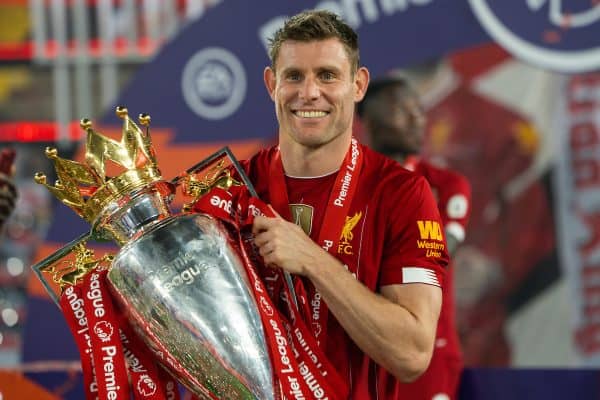 LIVERPOOL, ENGLAND - Wednesday, July 22, 2020: Liverpool’s James Milner celebrates with the Premier League trophy as the Reds are crowned Champions after the FA Premier League match between Liverpool FC and Chelsea FC at Anfield. The game was played behind closed doors due to the UK government’s social distancing laws during the Coronavirus COVID-19 Pandemic. (Pic by David Rawcliffe/Propaganda)